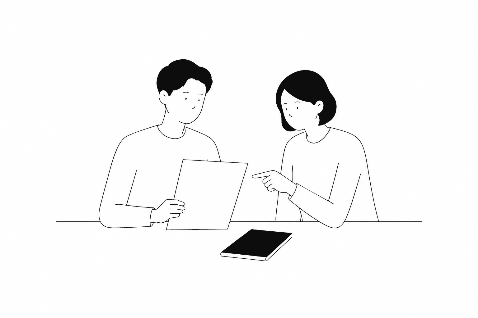 資料を見ながら業務を検討する二人